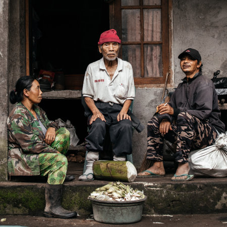 Portrait of three Indonesian people in the village. Indonesia, Bali, September 5, 2022.のeditorial素材