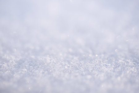 Background of fresh snow texture in blue toneの写真素材