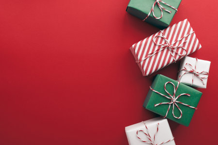 Gift boxes on color background, flat lay.