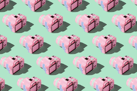 Pattern with camera on pastel color backgroundの写真素材