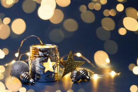 Christmas decorations with garland on dark background, copy spaceの写真素材