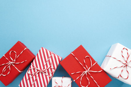 Gift boxes on color background, flat lay.