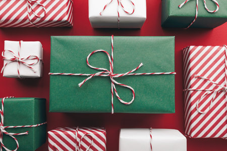 Gift boxes on color background, flat lay