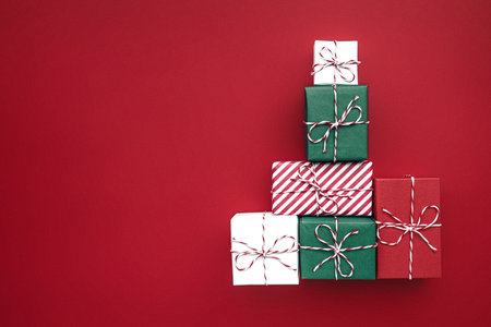 Gift boxes on color background, flat lay, space for text