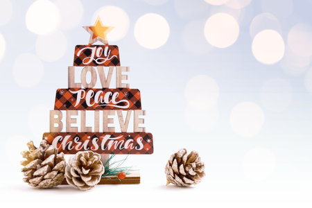 Wooden christmas tree toy on white background. Rustic styleの写真素材