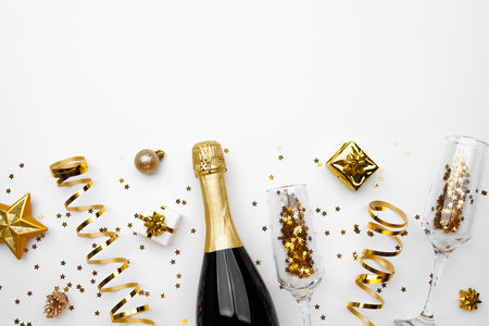 Christmas background with golden decoration on white background, flat lay, space for textの写真素材