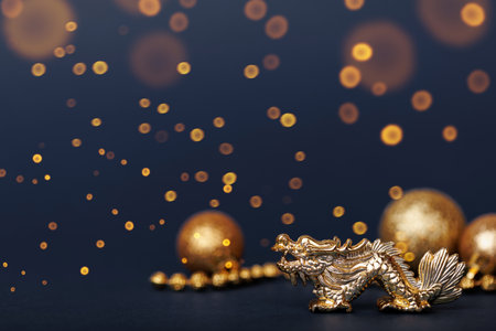 Golden dragon on a dark backgroundの写真素材