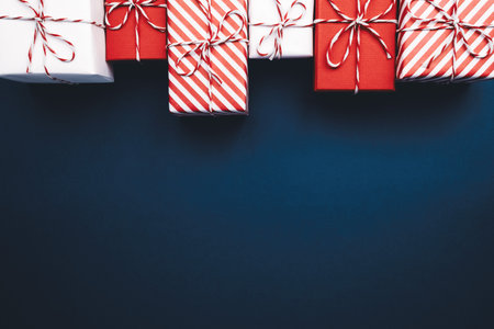 Gift boxes on color background, flat lay.