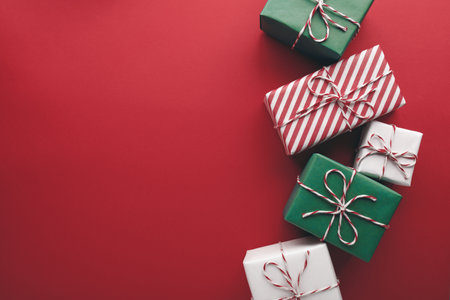 Gift boxes on color background, flat lay.の写真素材