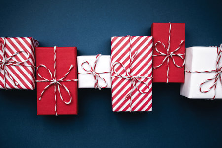 Gift boxes on color background, flat lay.