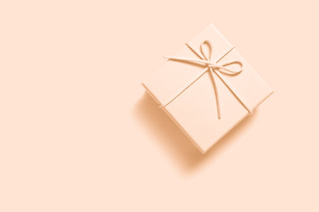 Pink gift or present box table top view. Flat layの写真素材