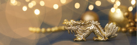 Golden dragon on a dark backgroundの写真素材