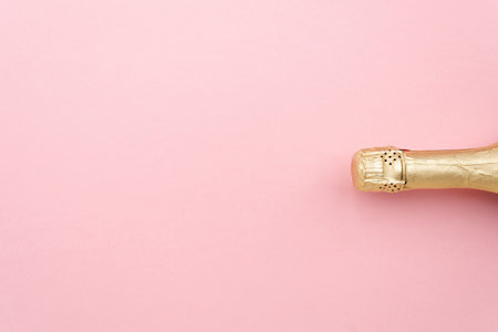 Champagne bottle on color background, top viewの写真素材