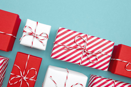Gift boxes on color background, flat lay.