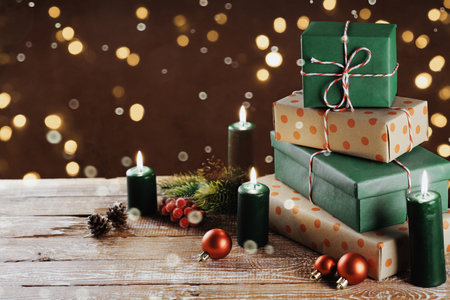 Christmas gift boxes with decoration on the table, rustic styleの写真素材