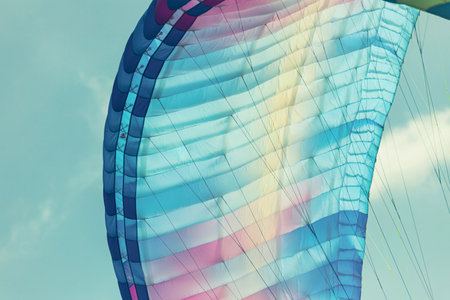 Colorful paraglider close-up against the blue sky. High quality photoの写真素材