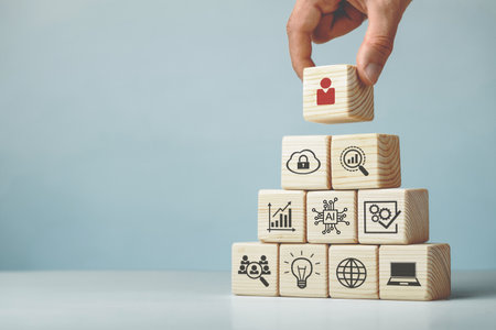 Assembled wooden cubes on the theme of business leadership.の写真素材
