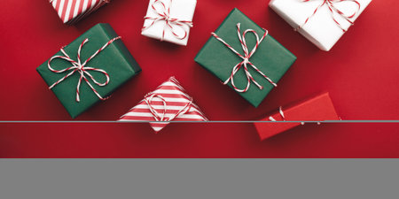 Color gift boxes on color background, flat layの写真素材