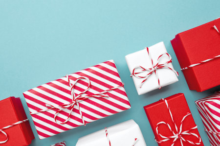 Gift boxes on color background, flat lay.の写真素材