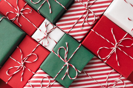 Gift boxes on color background, flat layの写真素材