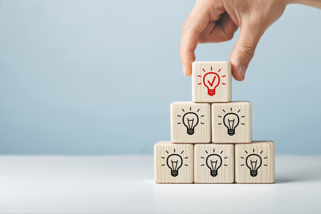Assembled wooden cubes on the theme of business ideas.の写真素材