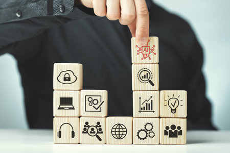 Assembled wooden cubes on the topic of the application of artificial intelligence in business.の写真素材