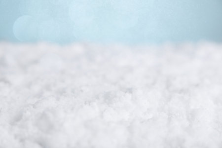 Gentle wintry scene, Gentle snowlike surface with understated color palette and blurred lightの写真素材