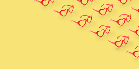 Pattern made with red heart shaped sunglasses on pastel color background