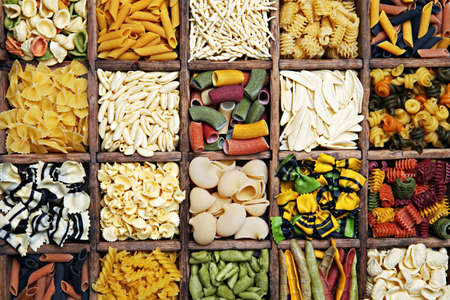 Italian pasta in the wooden box の写真素材