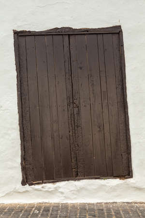 Curved antique door in Teguise, Lanzarote, Canary Islands, Spain.の写真素材