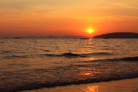 Aonang beach in the evening at sunset Krabi Thailand.の写真素材