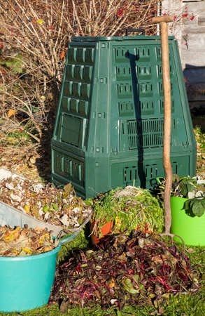Organic compost, compost bin, waste, mulch in a autumn garden.の写真素材