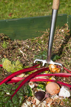 Garden fork in a compost bin