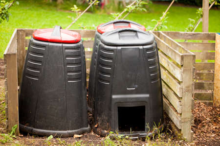 Compost bin in a summer garden