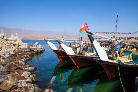 MIRBAT, OMAN - JANUARY 07,2016: Fishing boats (Dhow) in Mirbat port. Dhofar, Oman.のeditorial素材