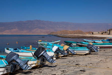 MIRBAT, OMAN - JANUARY 07,2016: small fishing boats in Mirbat, Dhofar, Omanのeditorial素材