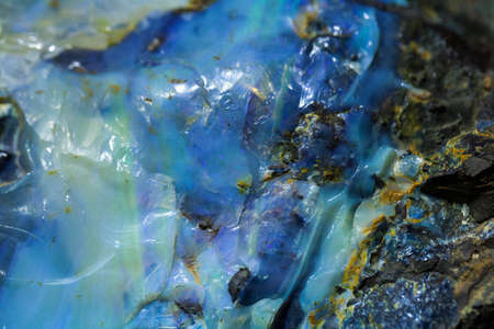 Opal close - up background texture. Opal is the national gemstone of Australia.