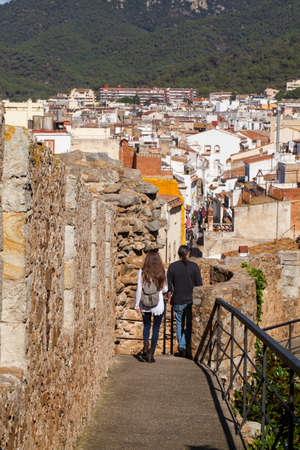 TOSSA DEL MAR, CATALONIA, SPAIN - OCTOBER 13, 2016: historic center of Tossa del Mar - medieval walls, Catalonia, Spain.の写真素材