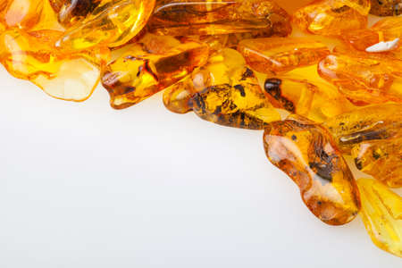 Amber stones from Baltic Sea, Lithuania, on a white background.の写真素材