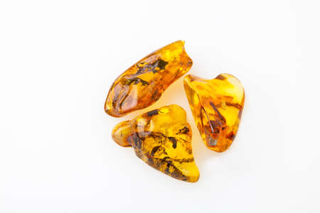 Amber stones from Baltic Sea, Lithuania, on a white background.の写真素材
