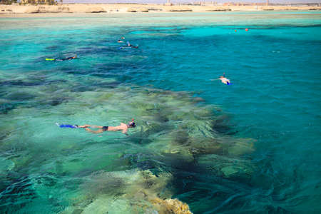 People snorkeling in a beautiful coral reef near Port Ghalib. Marsa Alam, Egyptのeditorial素材