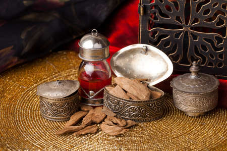 Agarwood, also called aloeswood, essential oil and incense chipsの写真素材