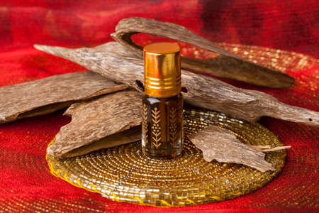 Agarwood, also called aloeswood, essential oil and incense chipsの写真素材