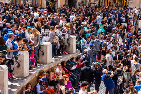 ROME, ITALY - APRIL 22, 2017: Tourists jam by world famous Trevi Fountain. Rome, Italy.のeditorial素材