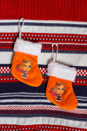 Christmas toy socks on a knitted