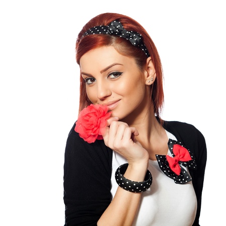 portrait of a beautiful young red head woman with hair accesories, isolated on white backgroundの写真素材