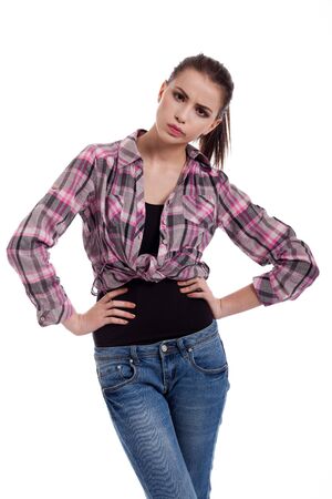 portrait of  a angry, beautiful teen girl,  isolated on white backgroundの写真素材