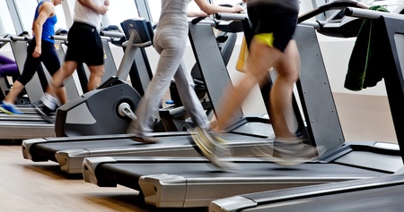 gym shot - people running on machines, treadmill