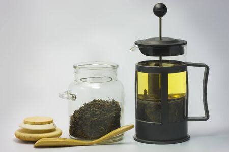 Teapot with green tea.の写真素材