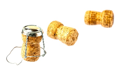 Three champagne corks closeup on white background. Isolated.の写真素材